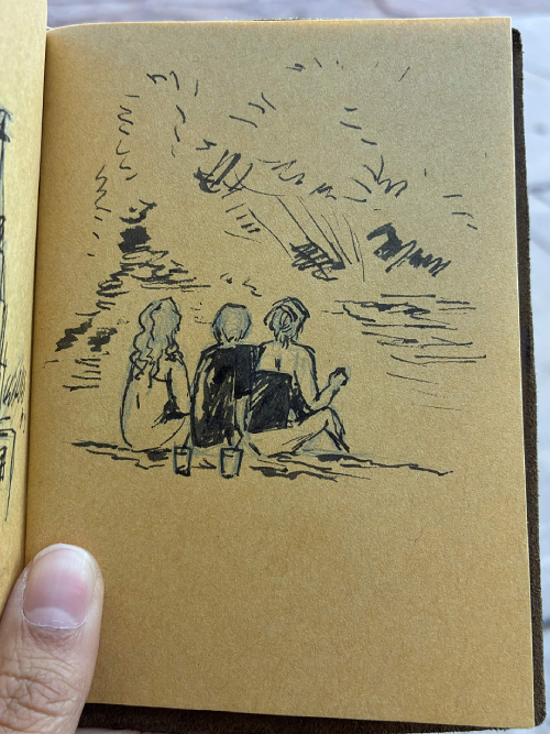 Drawing of people sitting by a lake